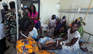 UNMISS staff members donate food and clothes at a women’s hospital in Rumbek