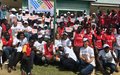 UN volunteers in South Sudan celebrate their day with school children; help the sick